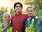 photo of Shailesh and his parents among the myrtle